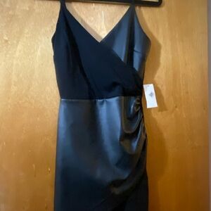 Beautiful little black dress size small new with tags perfect for a casual day